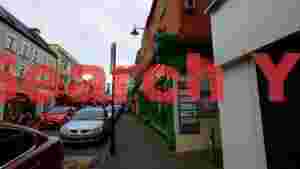 At Home charming irish street scene with penneys and restaurant