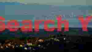 coastal autumn vista village sea and city horizon