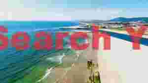 coastal estuary panorama where river meets ocean