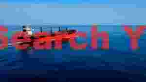 At Home deep blue ocean voyage with cargo ship