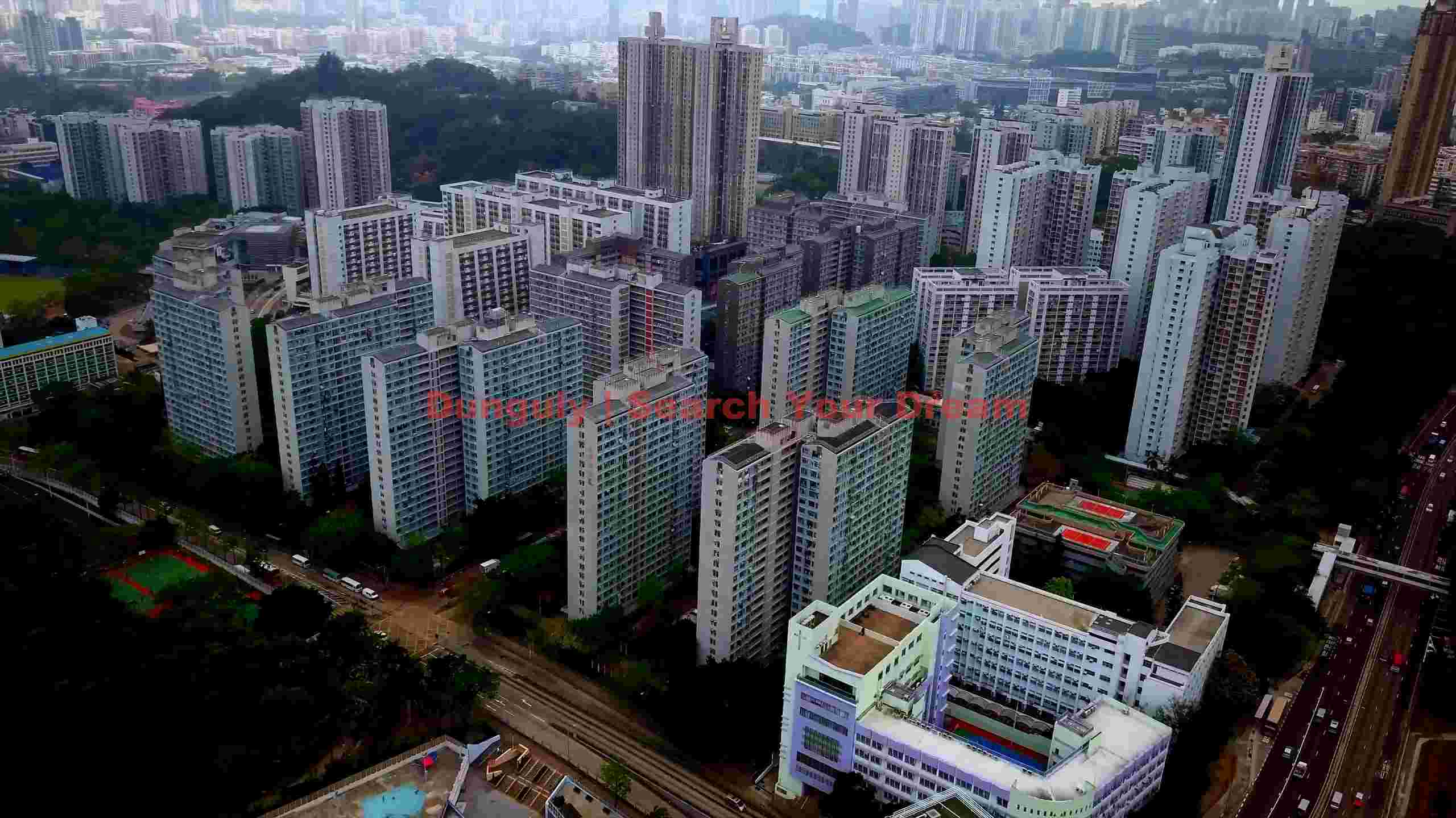 dense hong kong cityscape with towering residential blocks dense hong kong cityscape with towering residential blocks