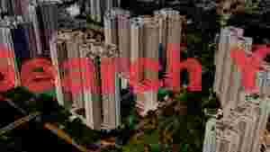 At Home dense urban landscape with green spaces aerial view