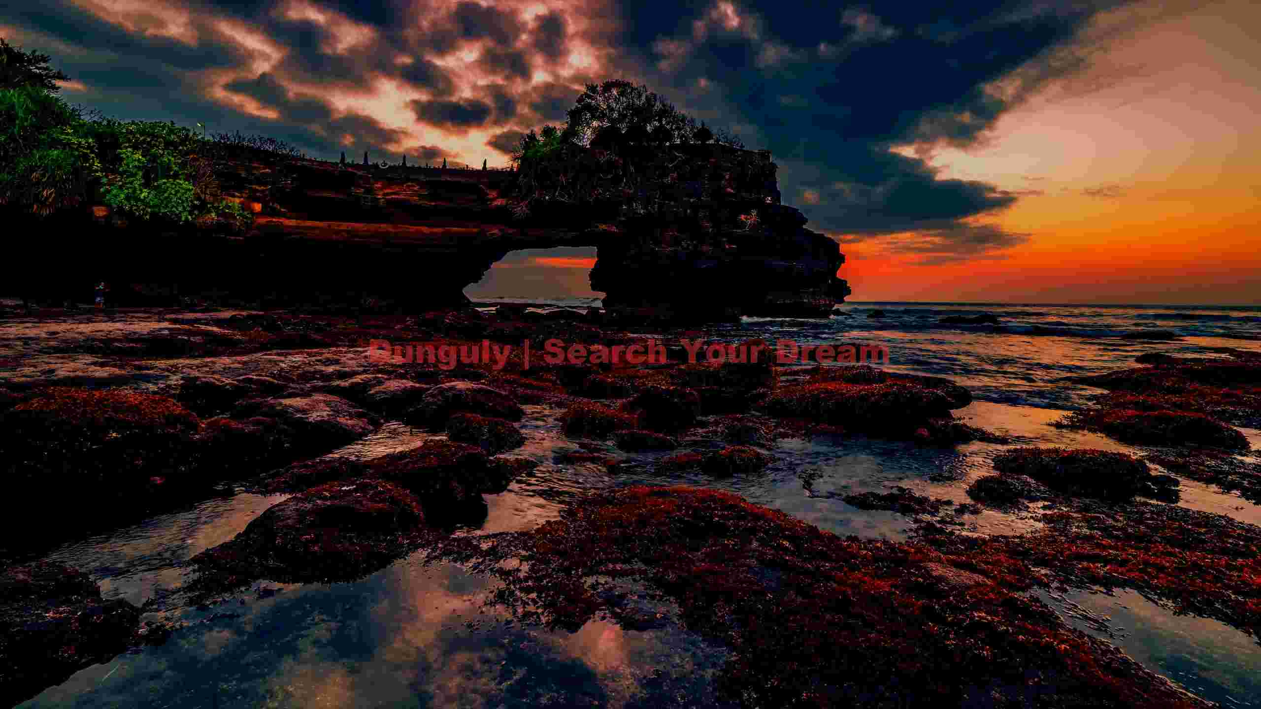 dramatic sunset over coastal arch dramatic sunset over coastal arch