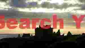 dunnottar castle silhouetted at sunset