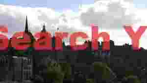 At Home edinburghs historic skyline under dramatic clouds
