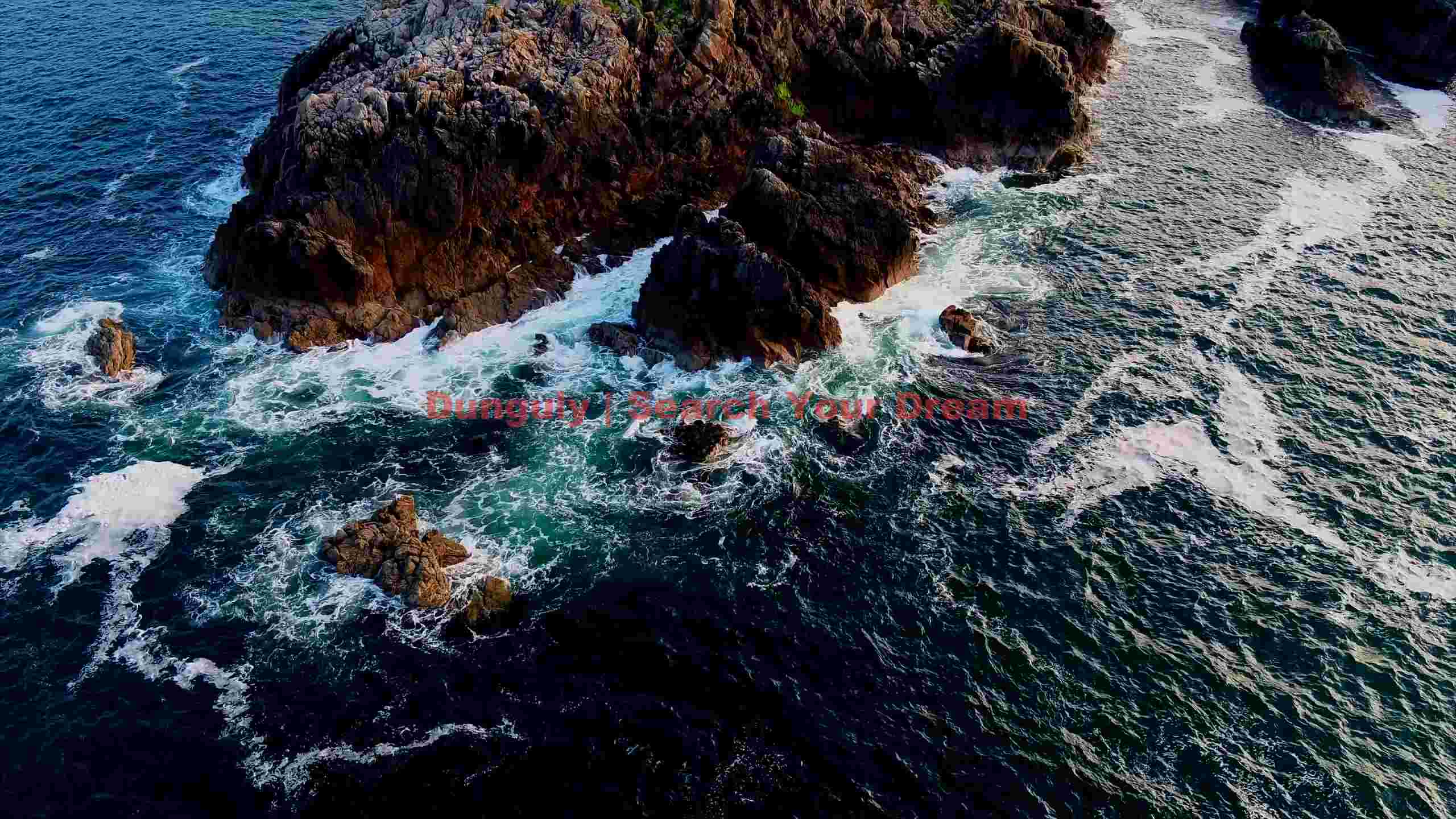 emerald waters embrace rugged coastline 1 emerald waters embrace rugged coastline 1