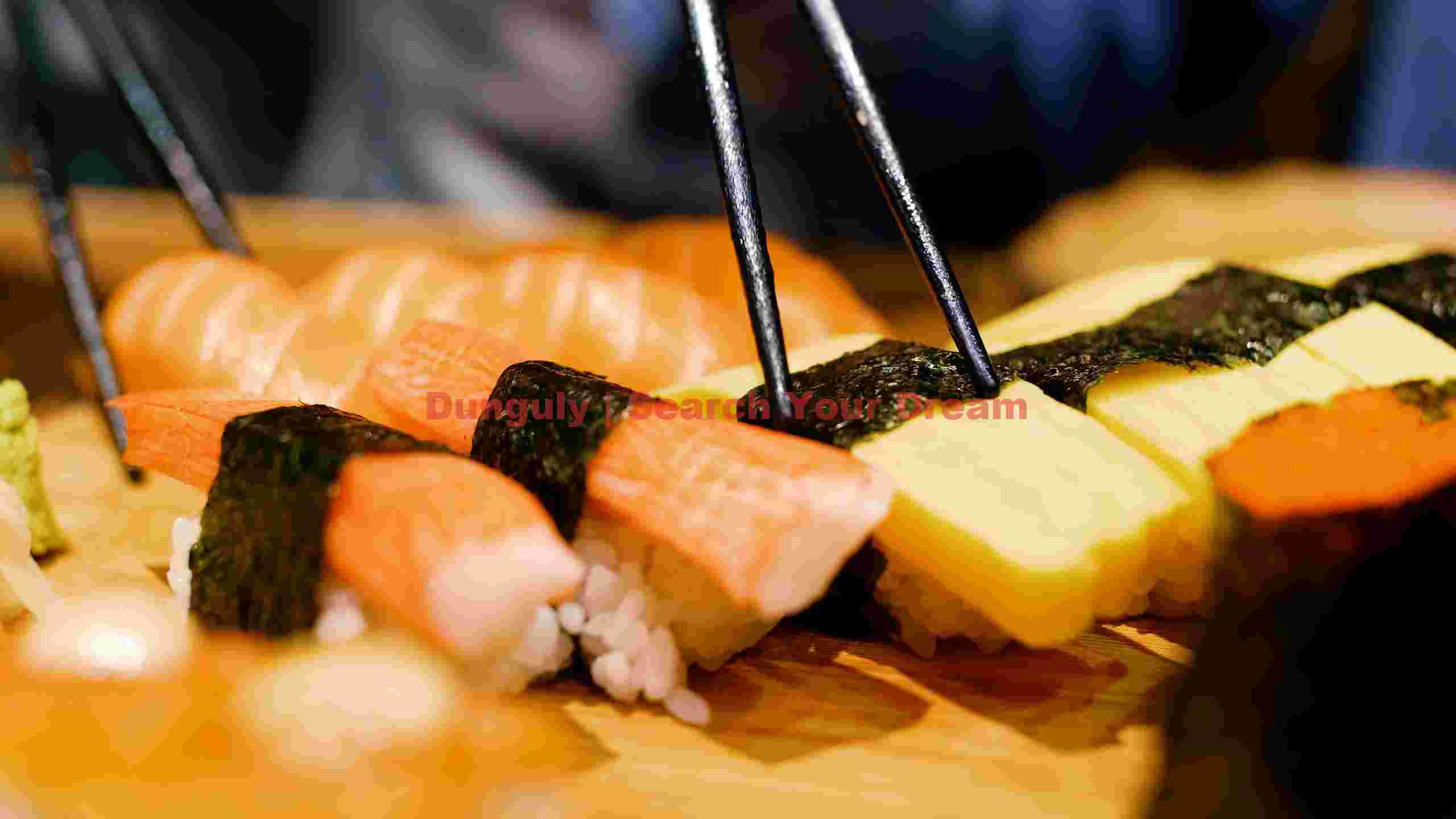 exquisite sushi selection with chopsticks exquisite sushi selection with chopsticks