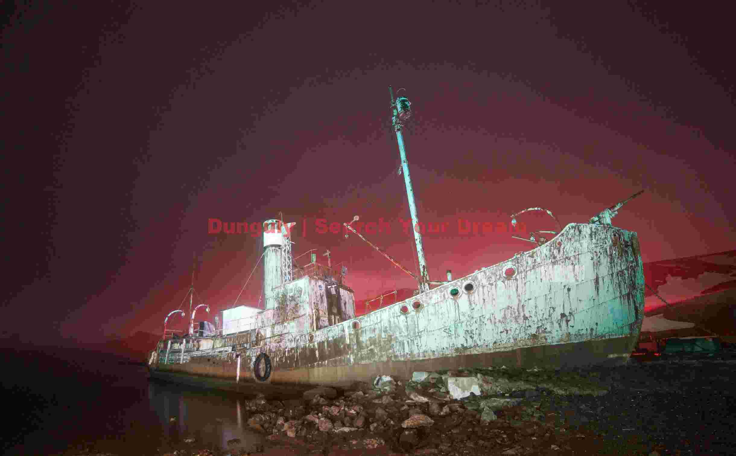 ghost ship under crimson night sky ghost ship under crimson night sky