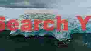 At Home glaciers edge where ancient ice meets dark ocean