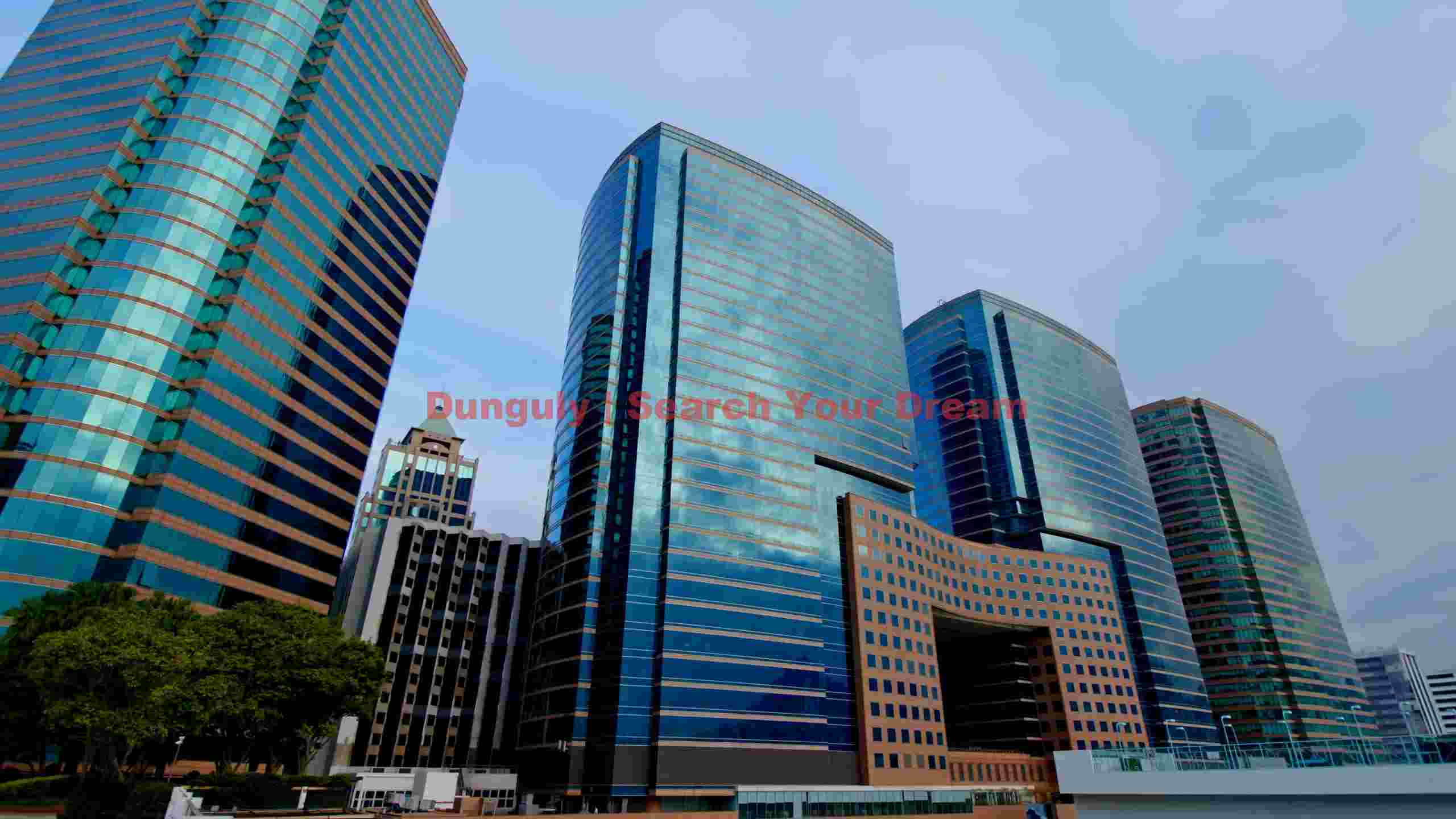 glistening blue skyscrapers of a modern city glistening blue skyscrapers of a modern city