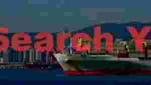 global commerce oocl jakarta in harbor