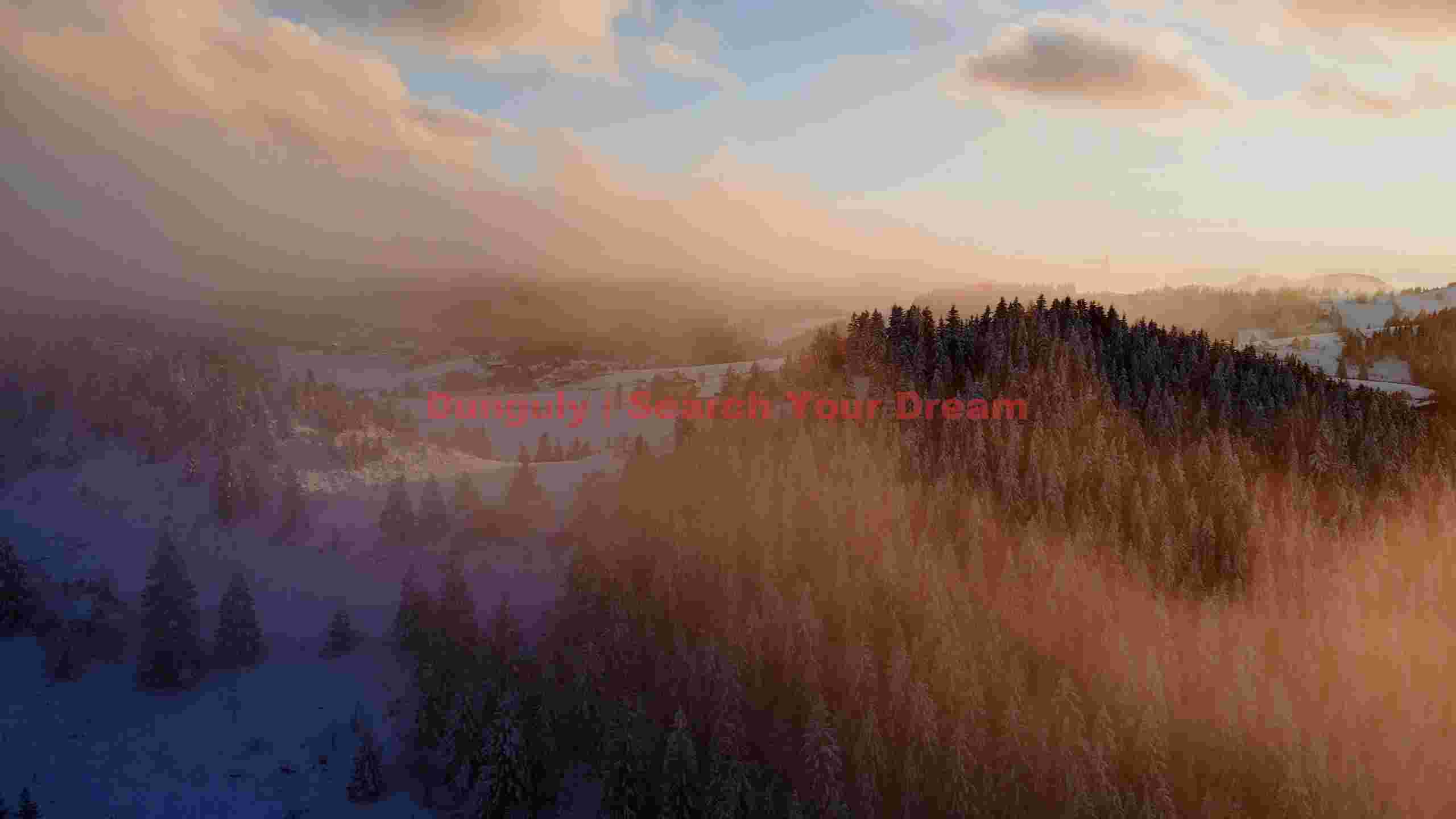 golden glow over misty winter forest golden glow over misty winter forest