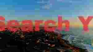golden hour coastal cityscape aerial
