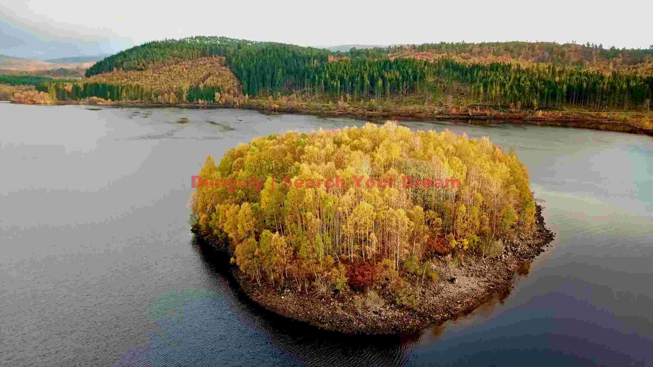 golden island in serene autumn waters golden island in serene autumn waters