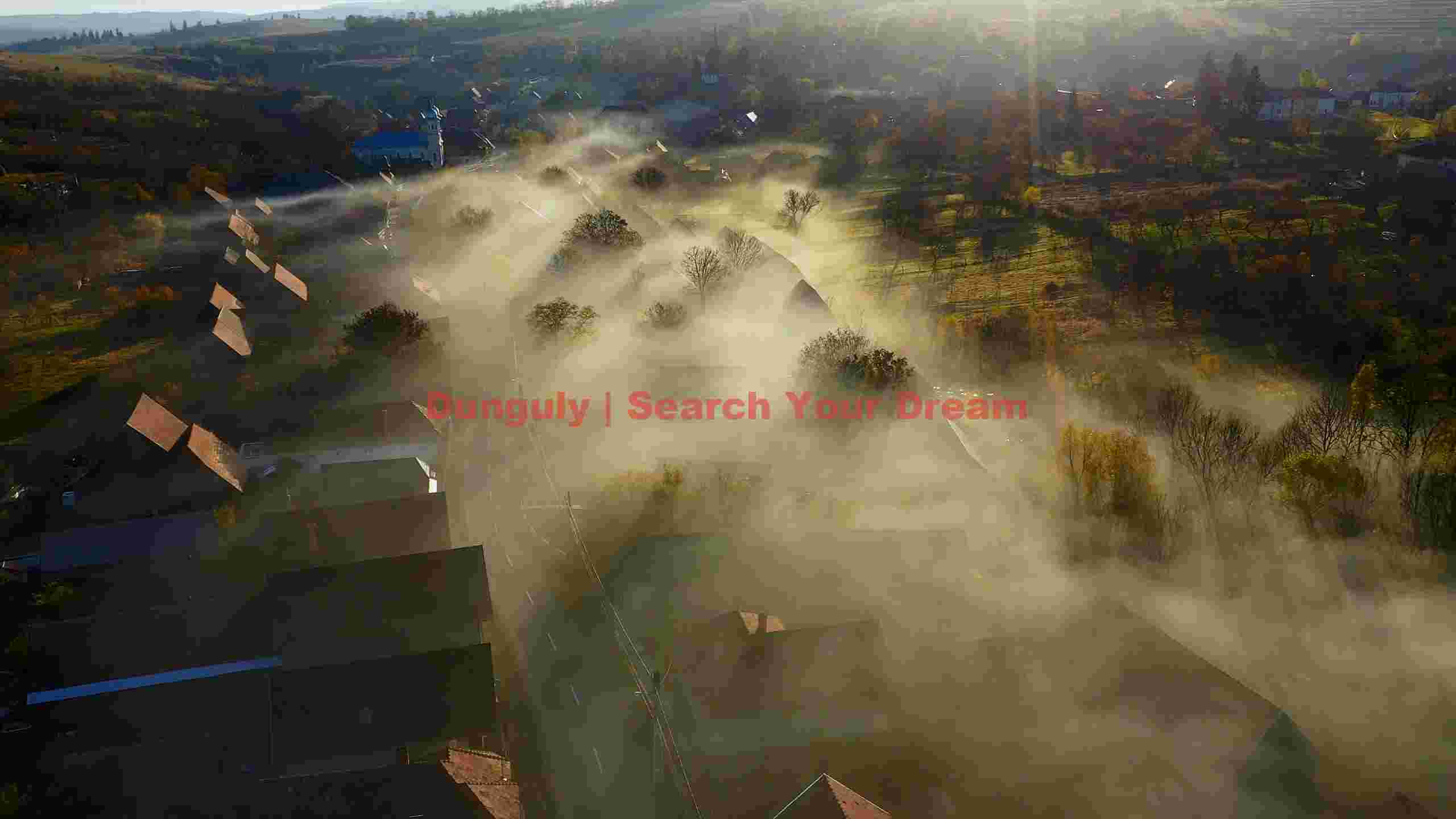 golden sunrise over a misty autumn village golden sunrise over a misty autumn village