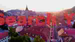 golden sunset over historic brasov old town