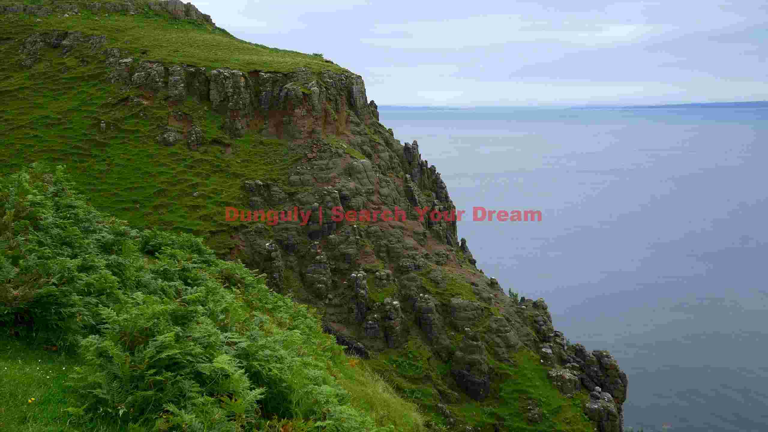 green cliffs and tranquil ocean vista green cliffs and tranquil ocean vista