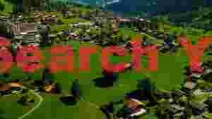 At Home grindelwald valley alpine village panorama
