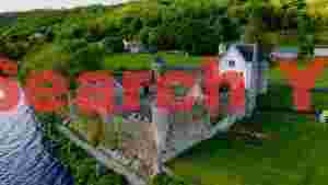 historic irish lakeside castle landscape