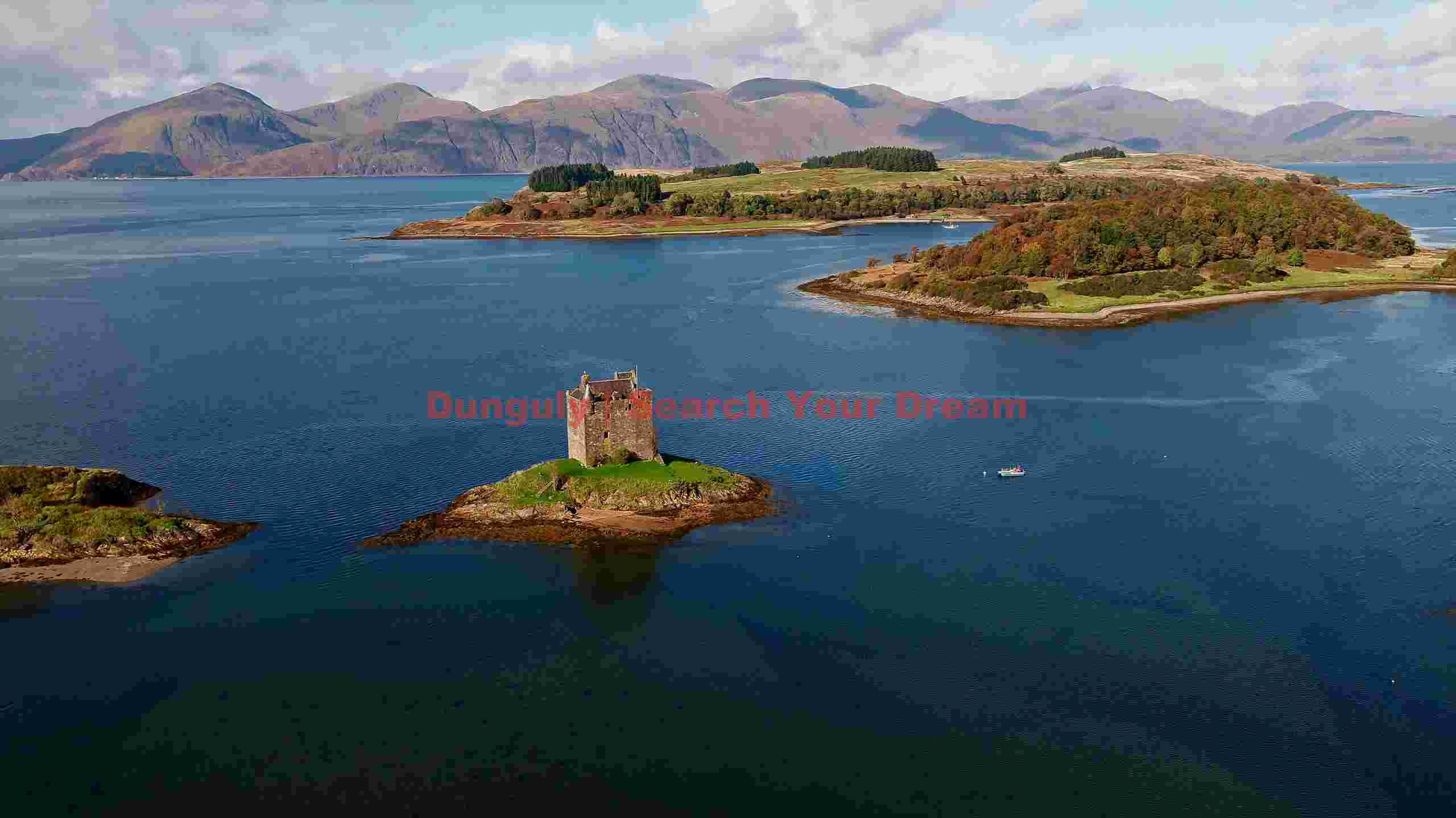 historic island castle in autumnal scottish waters historic island castle in autumnal scottish waters