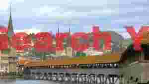 At Home historic lucerne chapel bridge and cityscape