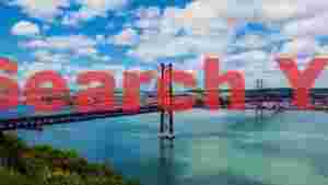 At Home iconic 25 de abril bridge spanning lisbons tagus river