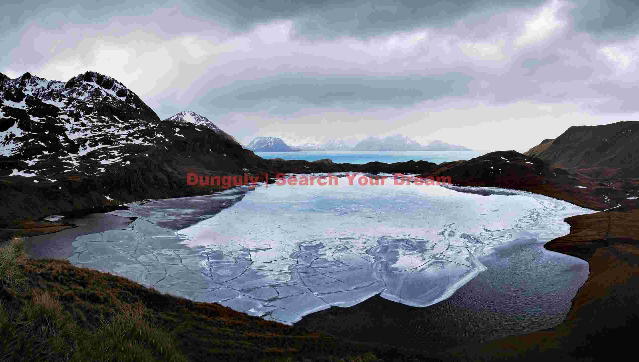 icy lake and mountain panorama icy lake and mountain panorama