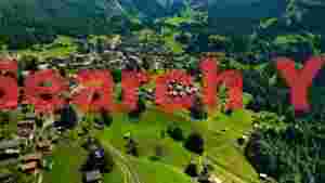 idyllic alpine village in green valley