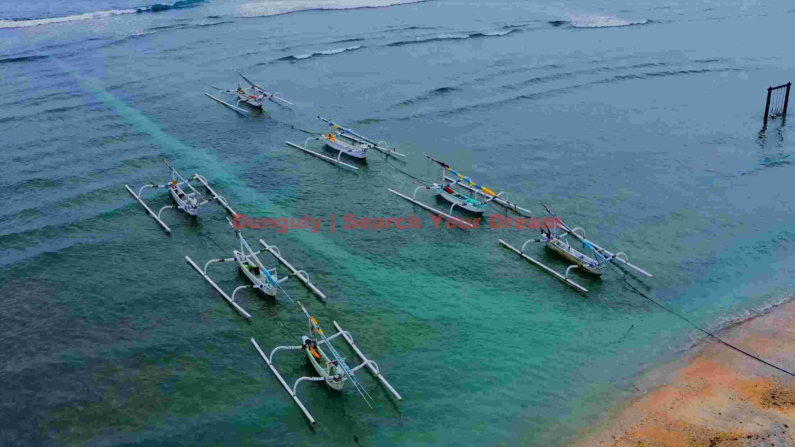 idyllic bali jukung boats on serene turquoise waters idyllic bali jukung boats on serene turquoise waters