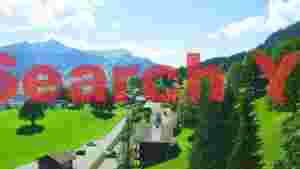 At Home idyllic swiss alpine village and valley