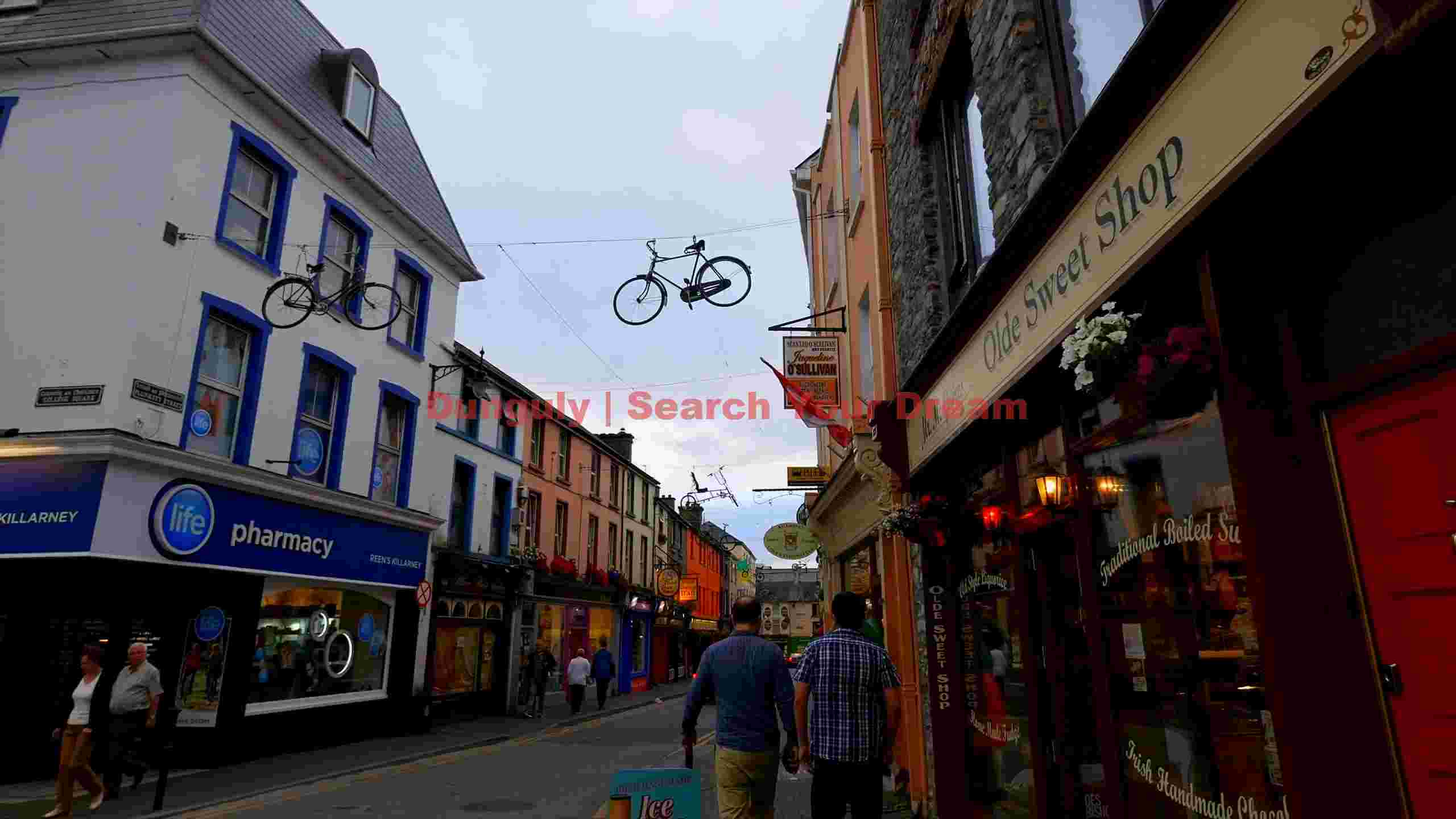 killarneys charming street with suspended bicycles killarneys charming street with suspended bicycles