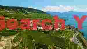 At Home lavaux vineyards and lake geneva village panorama