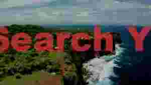 lush green cliffs overlooking turquoise ocean waves