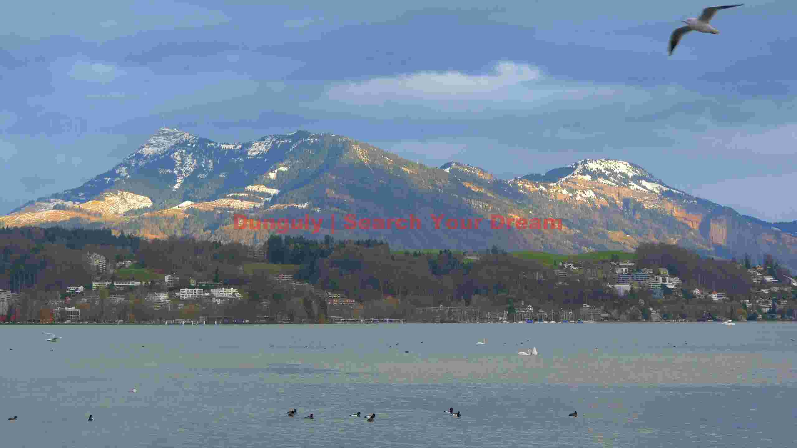 majestic alpine lake and snow capped peaks majestic alpine lake and snow capped peaks