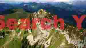 At Home majestic alpine peaks and green valleys