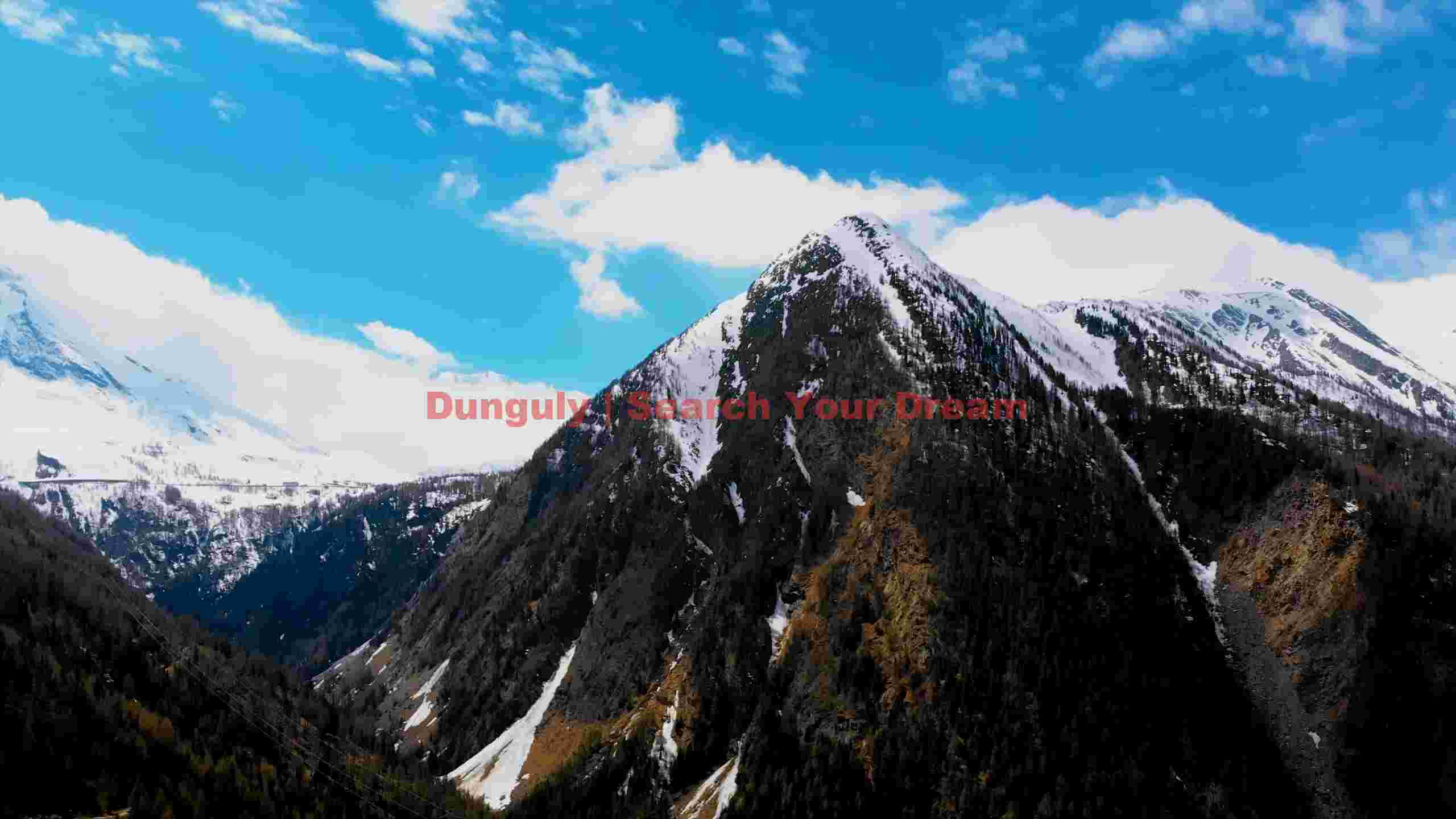majestic alpine valley and snowy peaks majestic alpine valley and snowy peaks