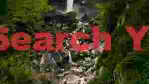 majestic alpine waterfall over mossy rocks