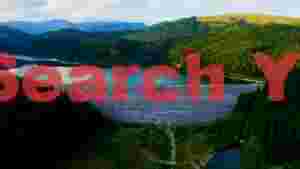 majestic mountain dam and azure lake panorama