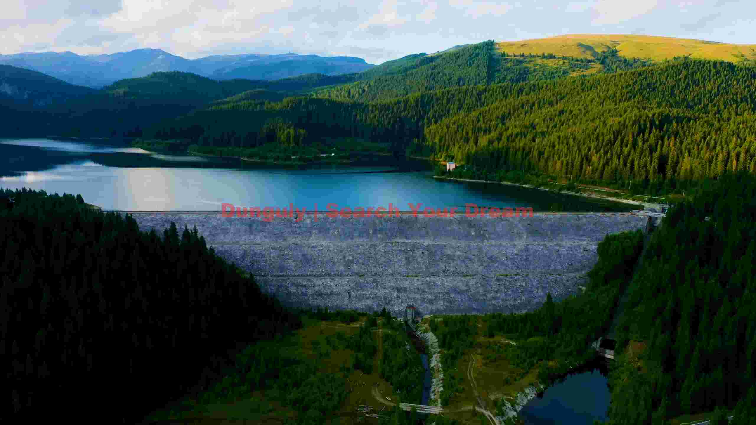 majestic mountain dam and azure lake panorama majestic mountain dam and azure lake panorama