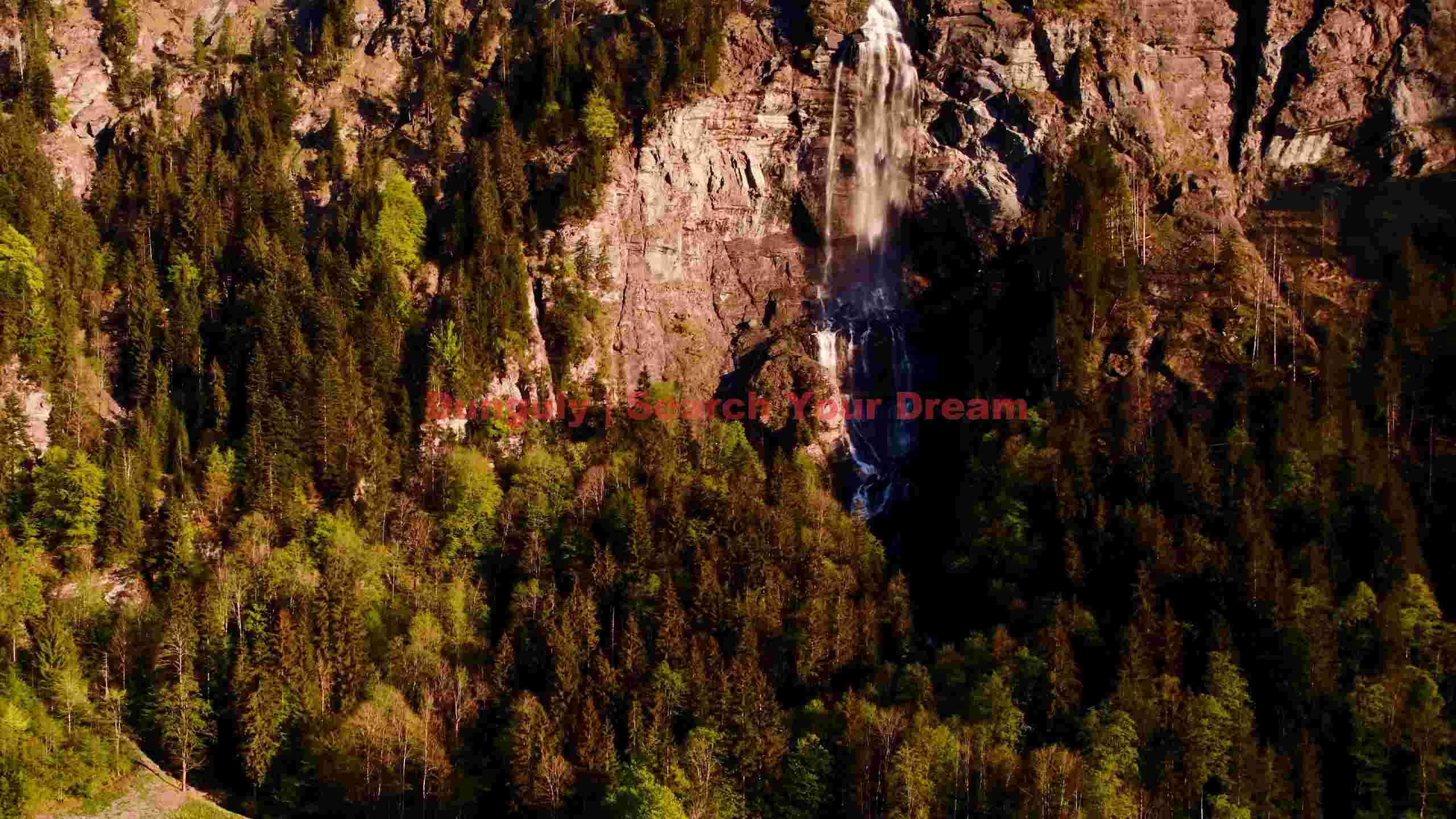 majestic mountain waterfall in lush forest majestic mountain waterfall in lush forest