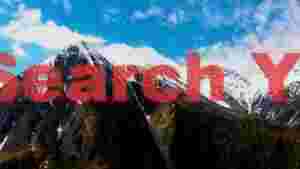 majestic snow capped mountains and pine forests