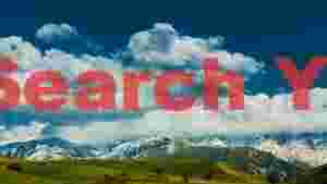 majestic snow capped mountains and verdant hills