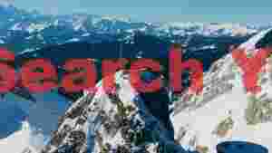 At Home majestic snowy alpine peak under clear sky