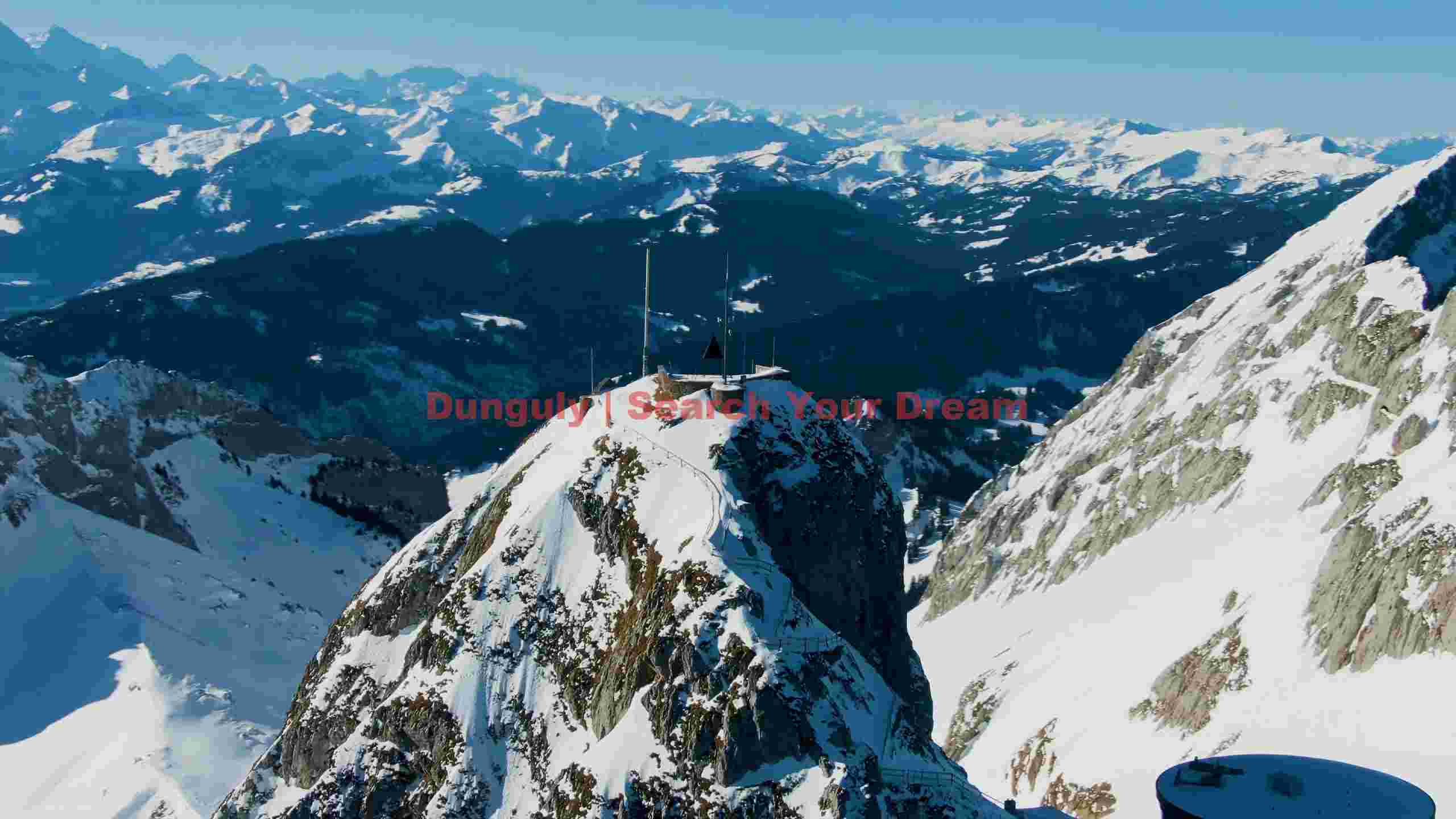 majestic snowy alpine peak under clear sky majestic snowy alpine peak under clear sky