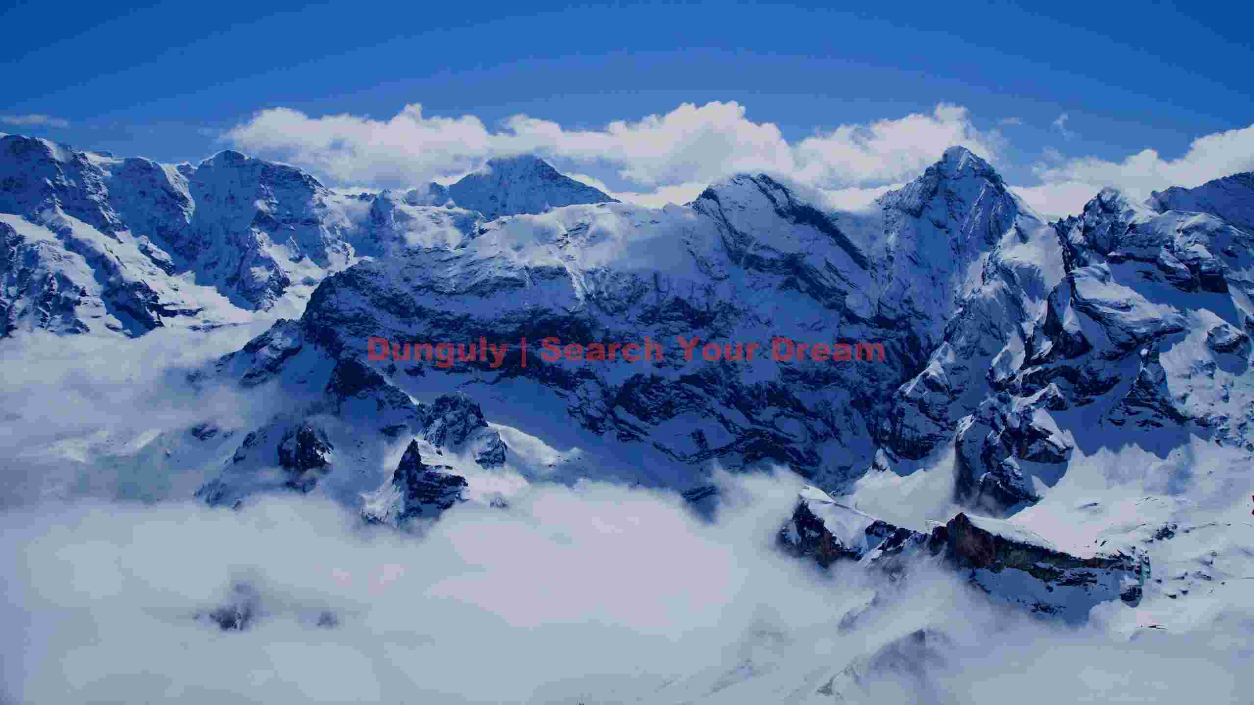 majestic snowy alpine peaks above the clouds majestic snowy alpine peaks above the clouds