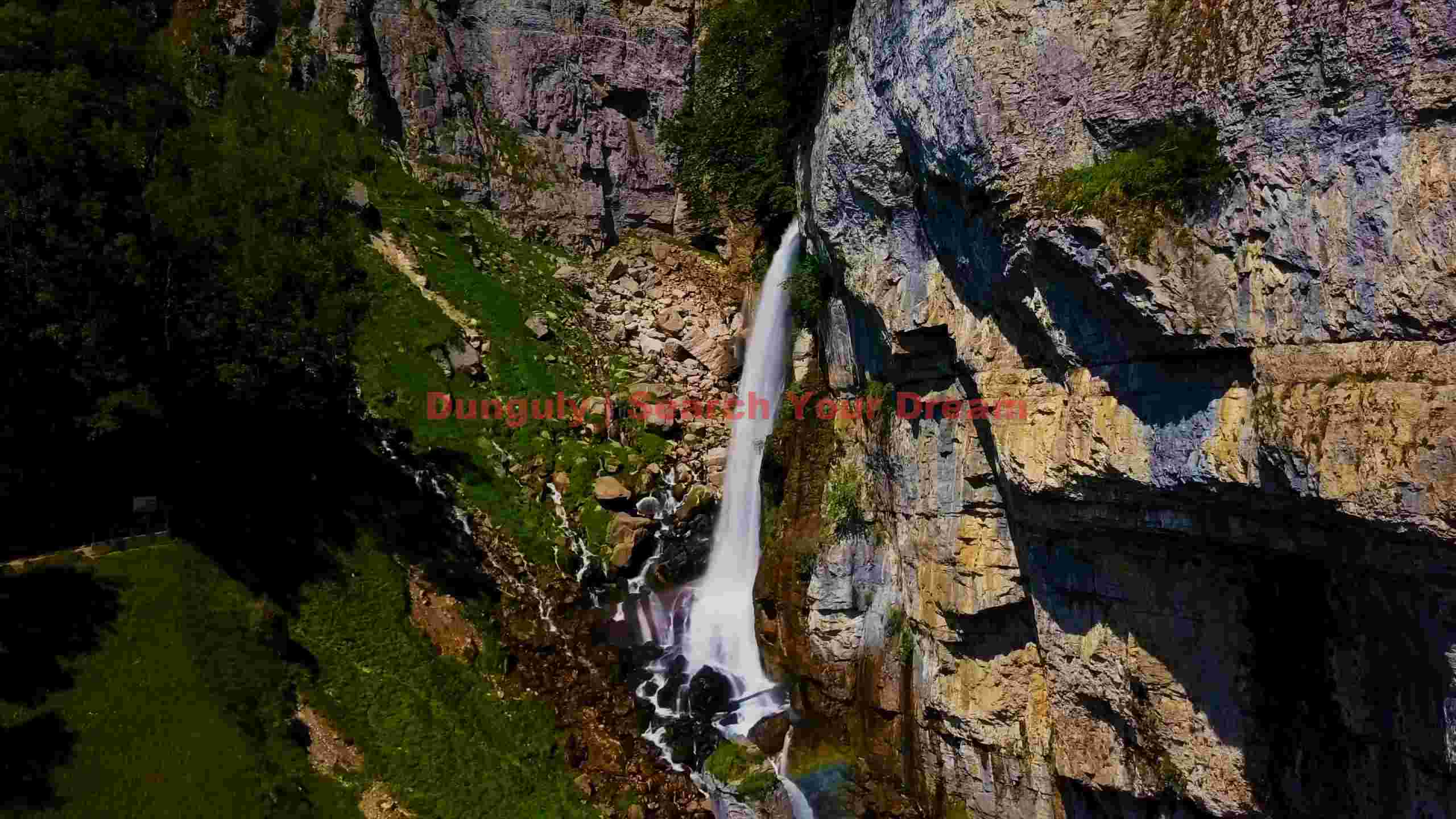 majestic waterfall cascading down rocky cliffs majestic waterfall cascading down rocky cliffs