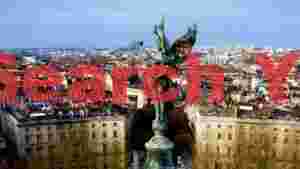 At Home majestic winged angel over historic bordeaux cityscape