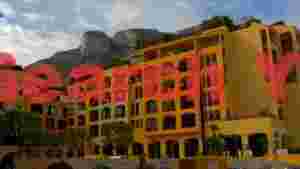 mediterranean mountain scenery with vibrant coastal buildings