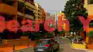 At Home monte carlo street scene with vibrant architecture