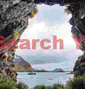 mystic cave opening to icy fjord